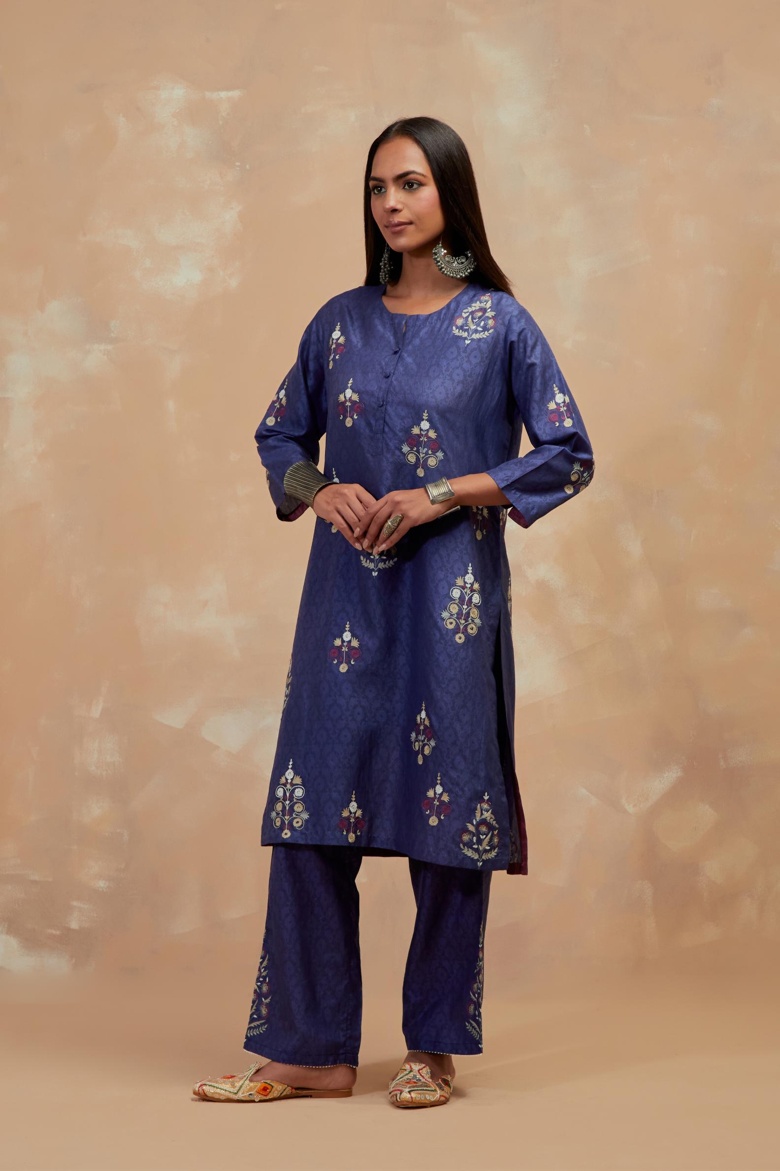 Ford blue silk hand block printed short kurta set, highlighted with multi colored silk thread embroidery.
