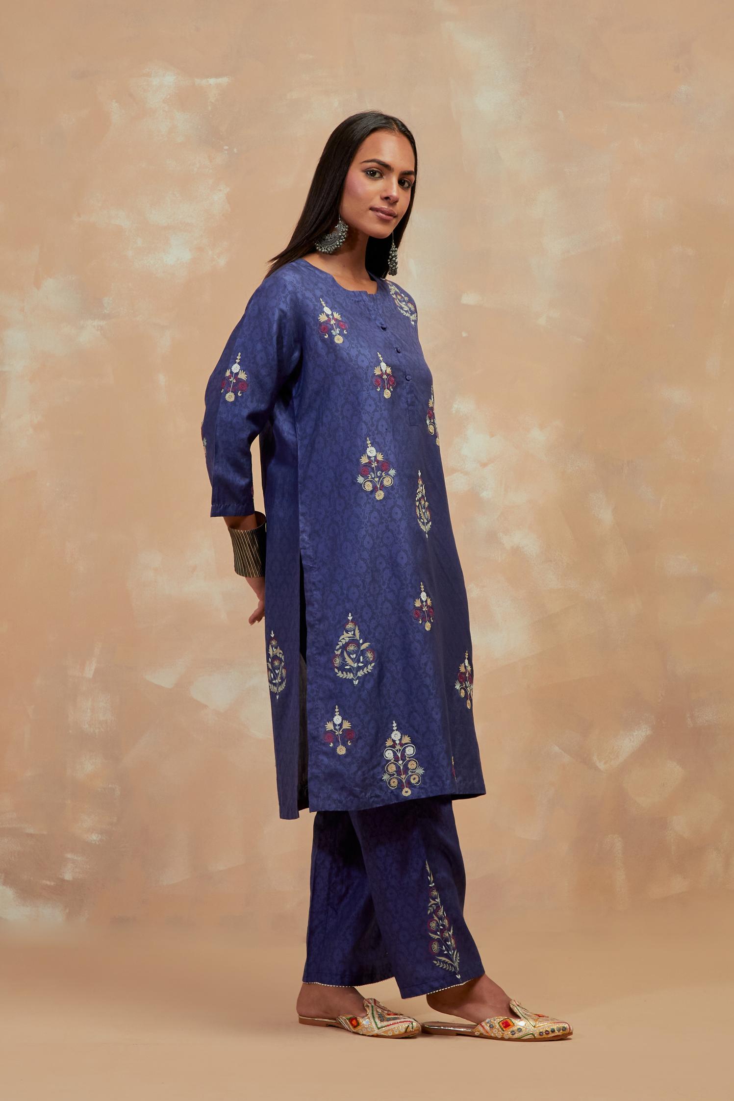 Ford blue silk hand block printed short kurta set, highlighted with multi colored silk thread embroidery.