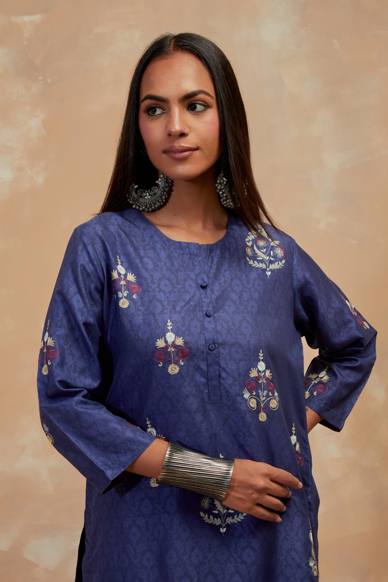 Ford blue silk hand block printed short kurta set, highlighted with multi colored silk thread embroidery.