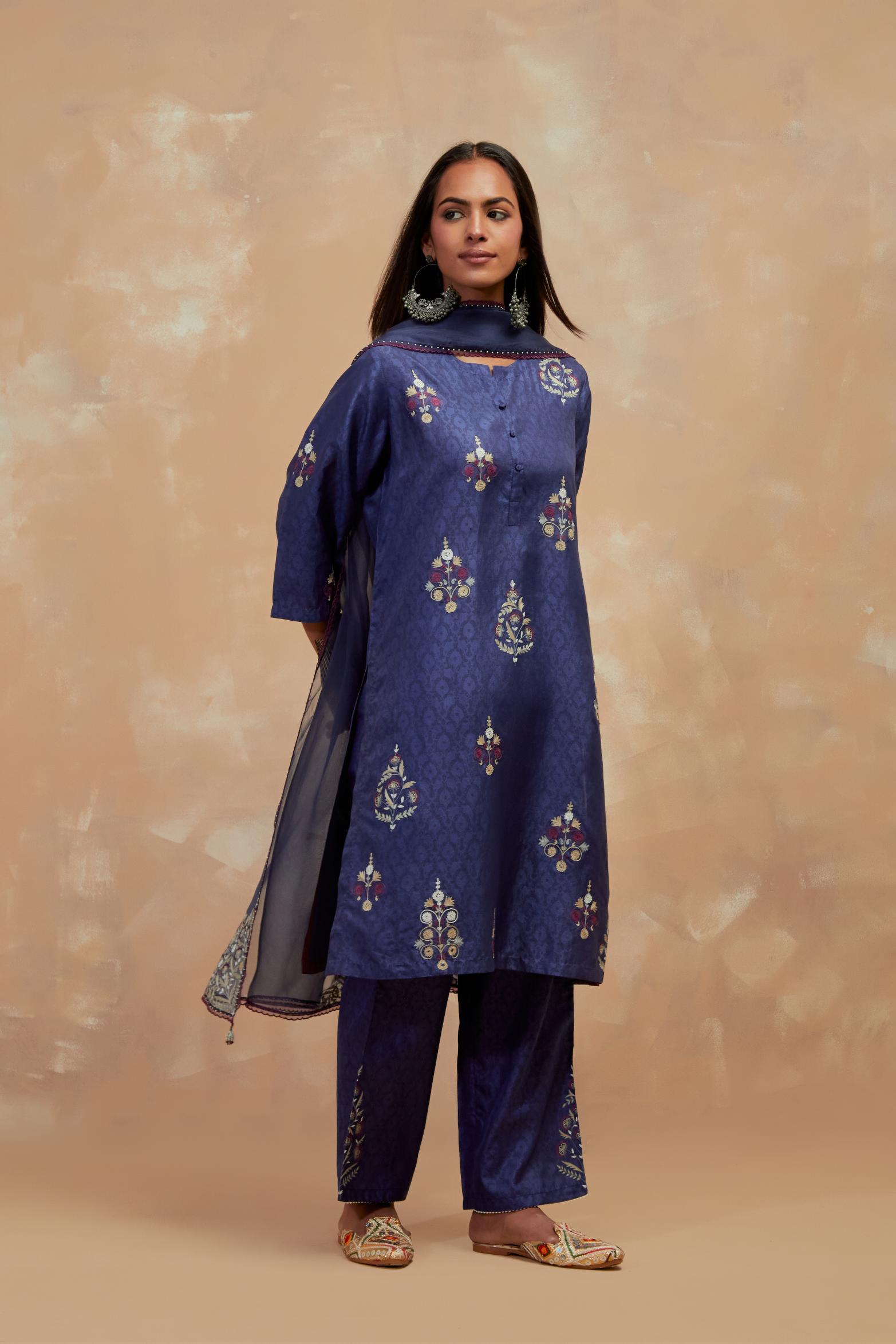 Ford blue silk hand block printed short kurta set, highlighted with multi colored silk thread embroidery.
