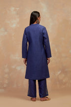 Ford blue silk, quilted mid- length front open jacket with all-over hand block print.