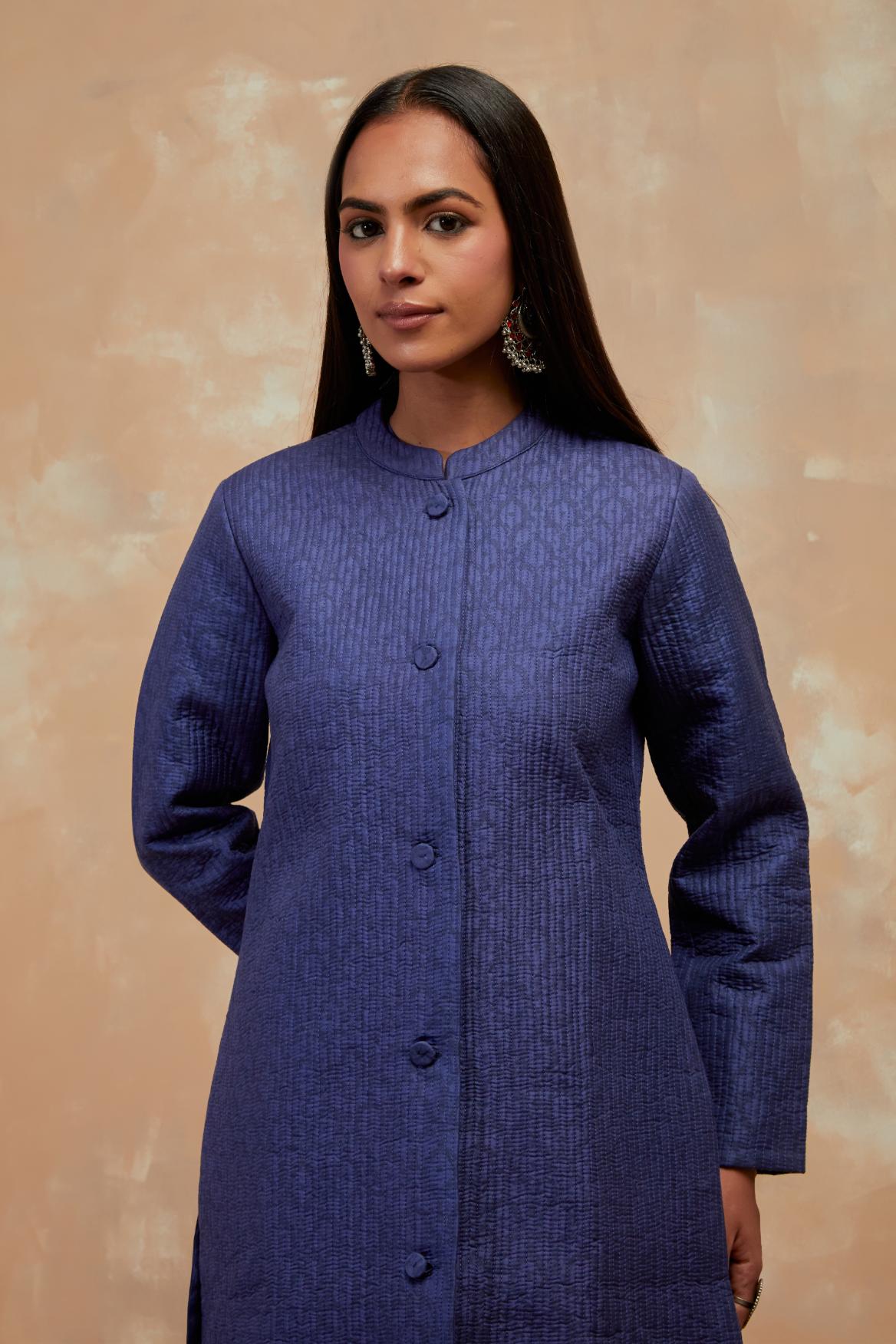 Ford blue silk, quilted mid- length front open jacket with all-over hand block print.