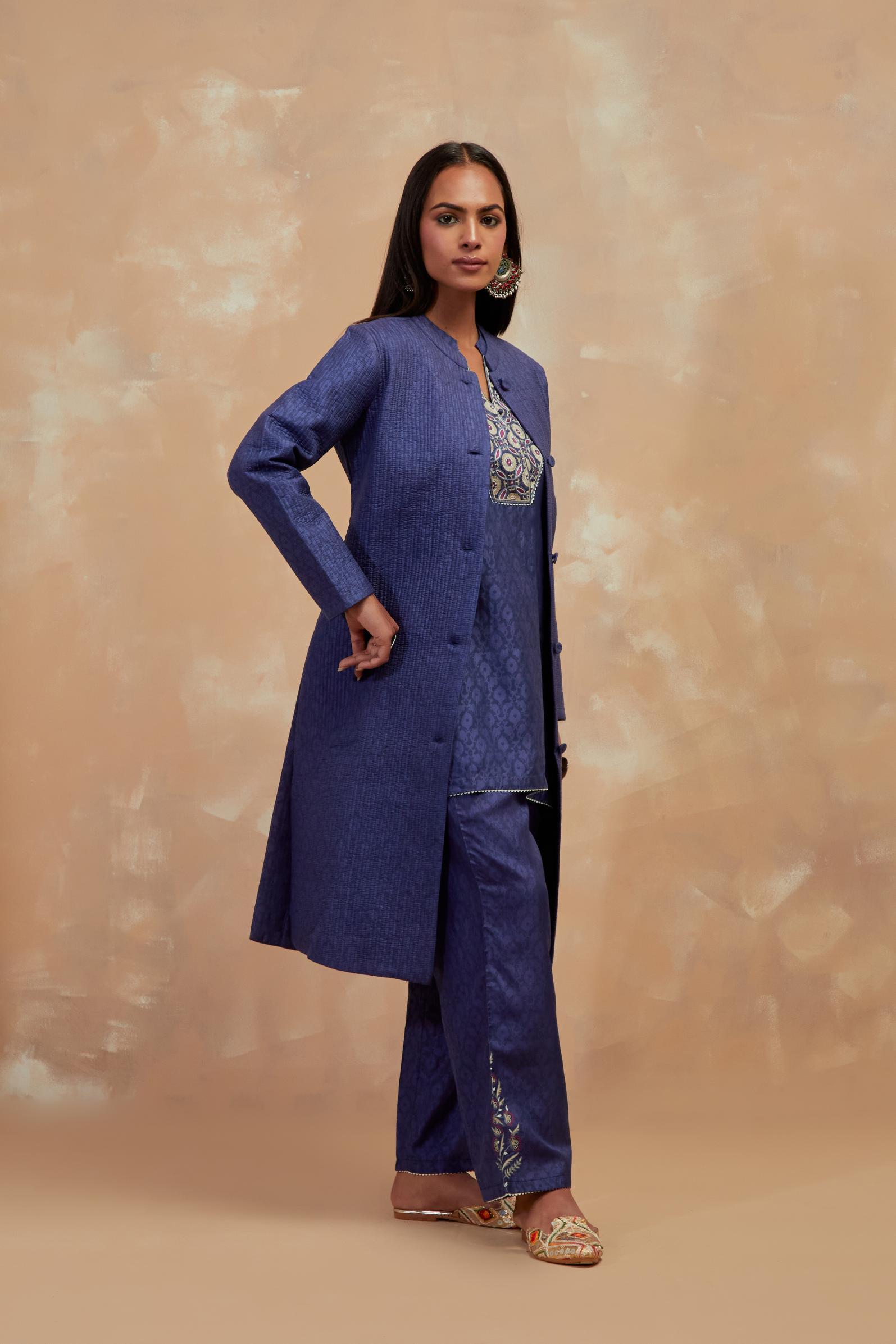 Ford blue silk, quilted mid- length front open jacket with all-over hand block print.
