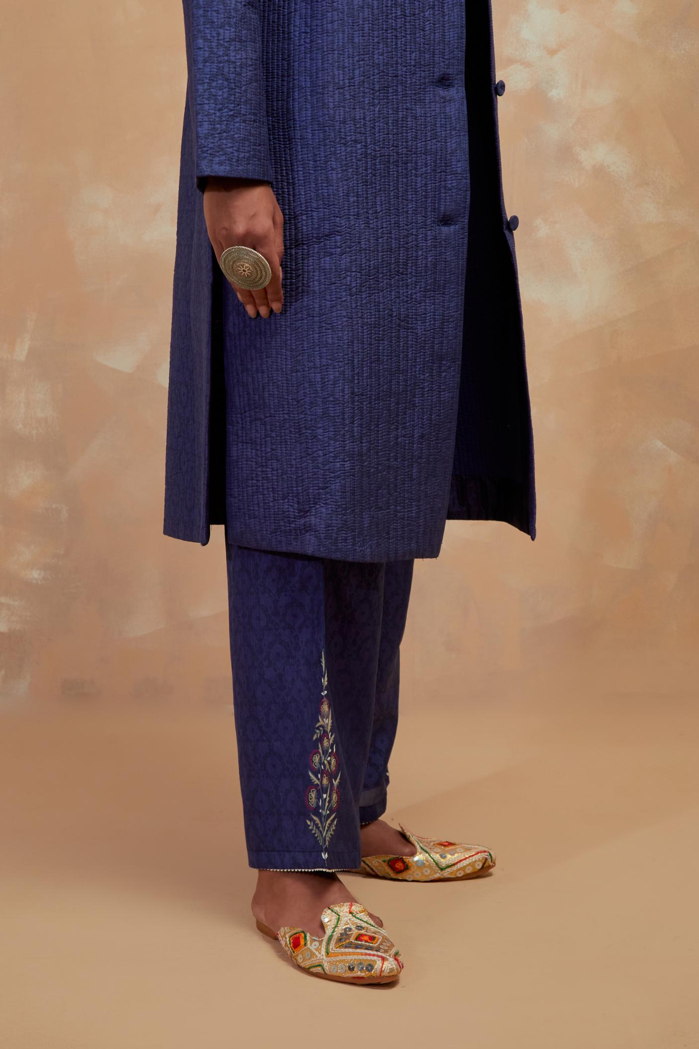 Ford blue silk, quilted mid- length front open jacket with all-over hand block print.
