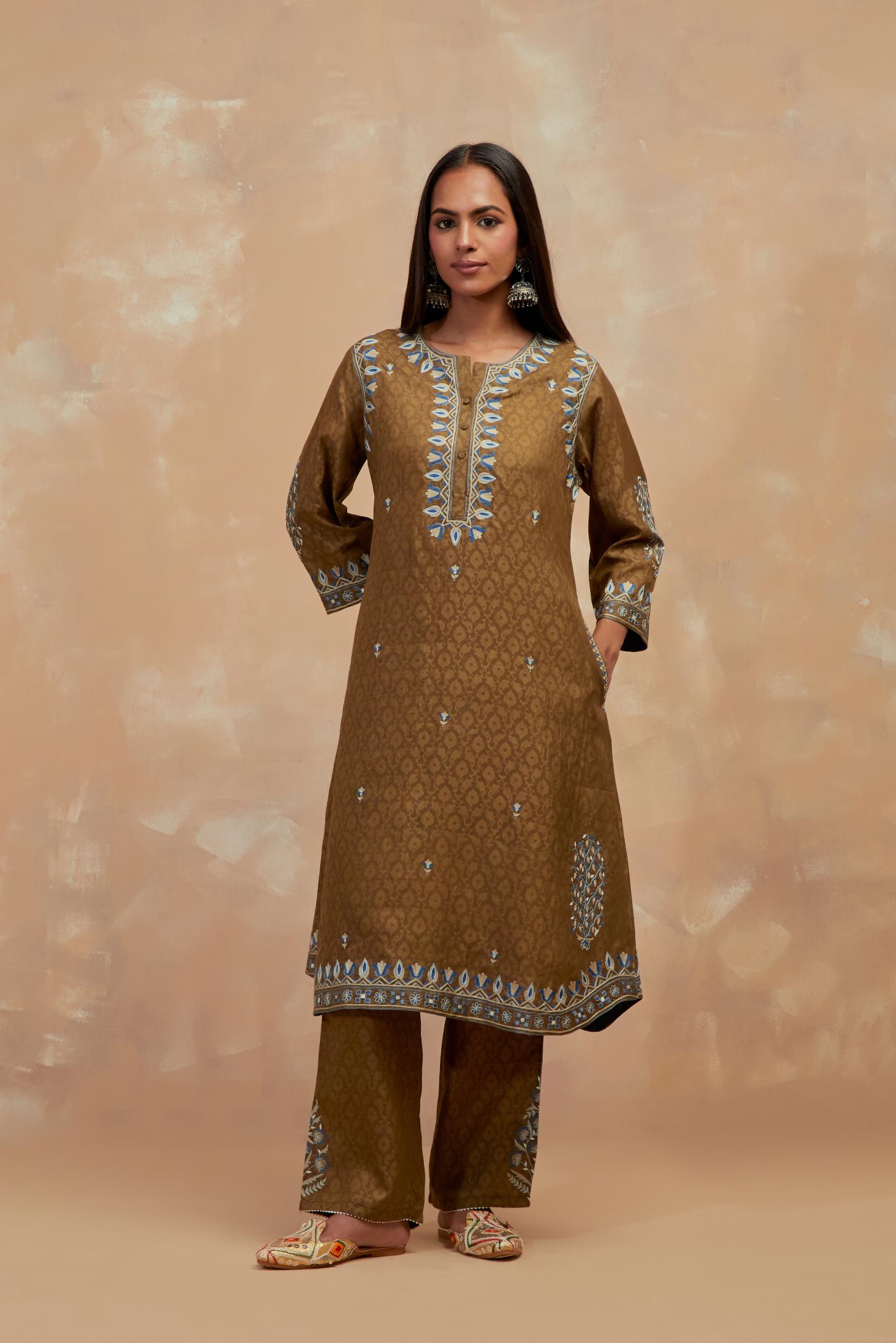 Olive green silk hand block printed short kurta set with round hem and multi colored silk thread embroidery all over the kurta.