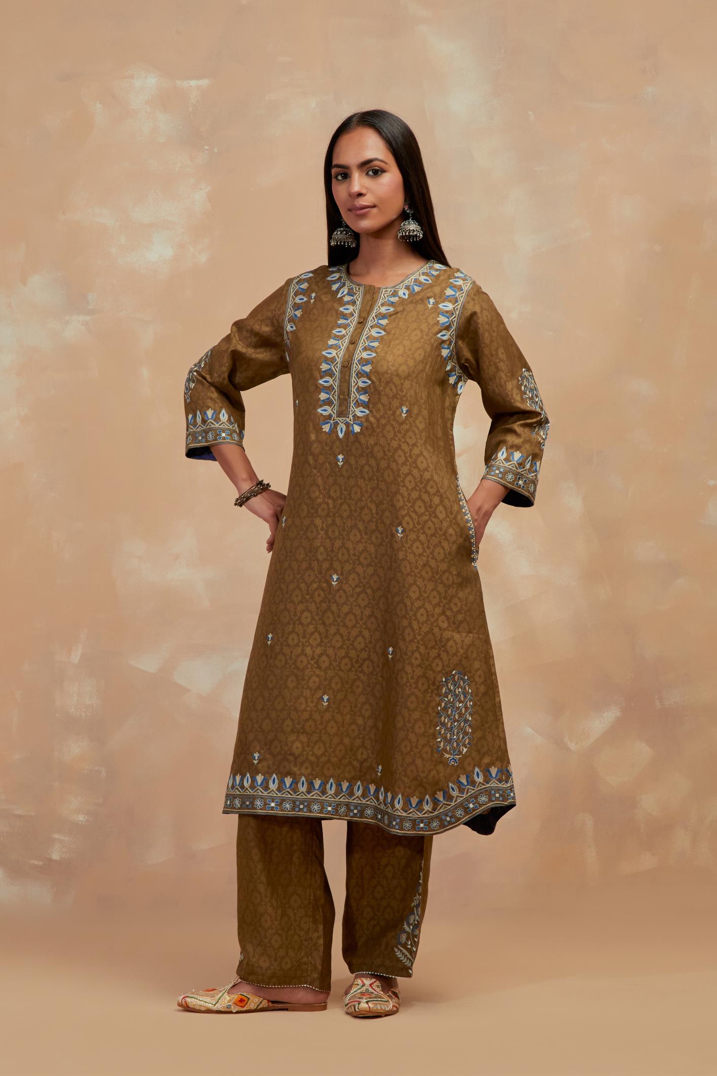 Olive green silk hand block printed short kurta set with round hem and multi colored silk thread embroidery all over the kurta.