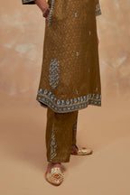 Olive green silk hand block printed short kurta set with round hem and multi colored silk thread embroidery all over the kurta.