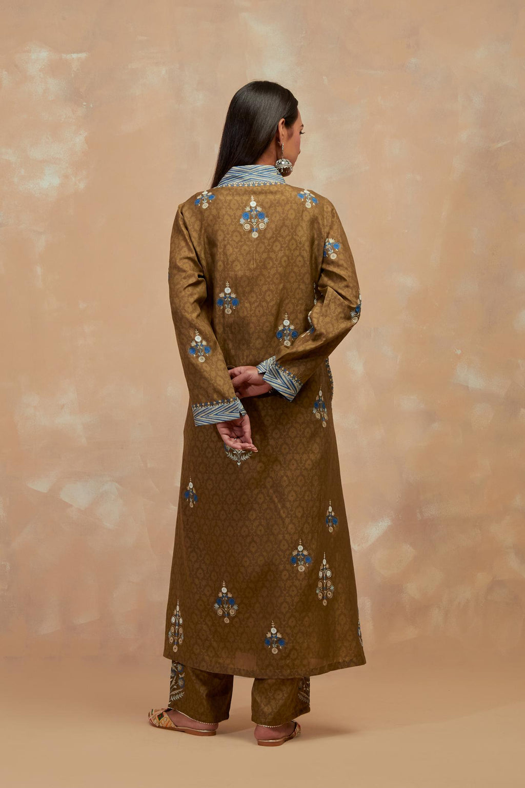 Olive green silk hand block printed easy fit kurta set, highlighted multicolored silk thread embroidery.