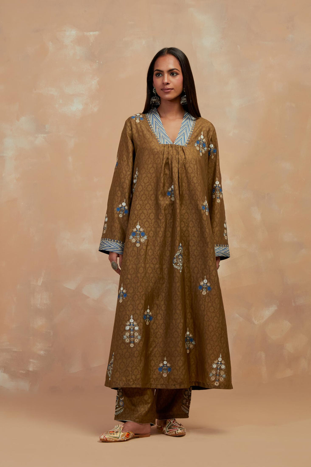 Olive green silk hand block printed easy fit kurta set, highlighted multicolored silk thread embroidery.