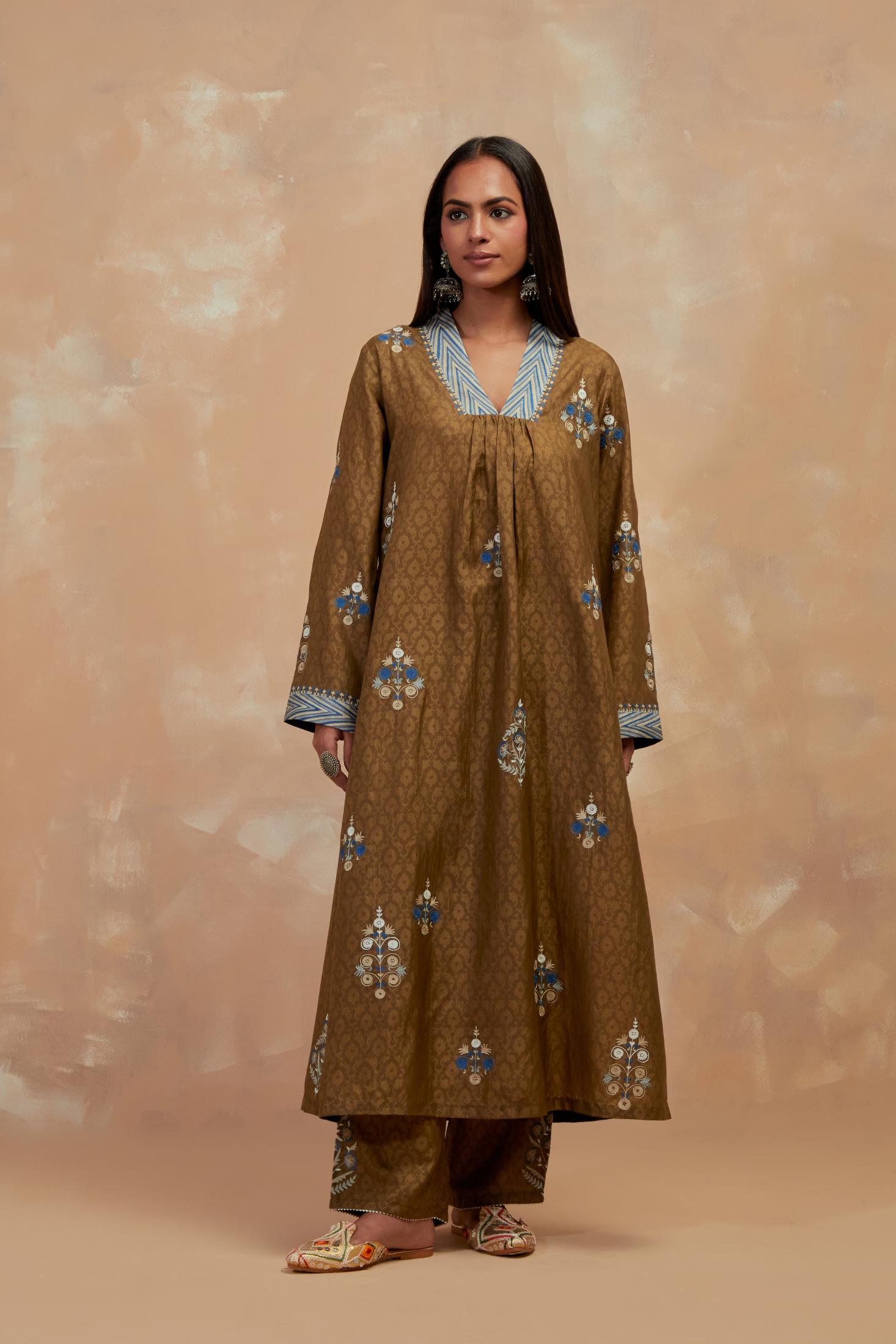 Olive green silk hand block printed easy fit kurta set, highlighted multicolored silk thread embroidery.
