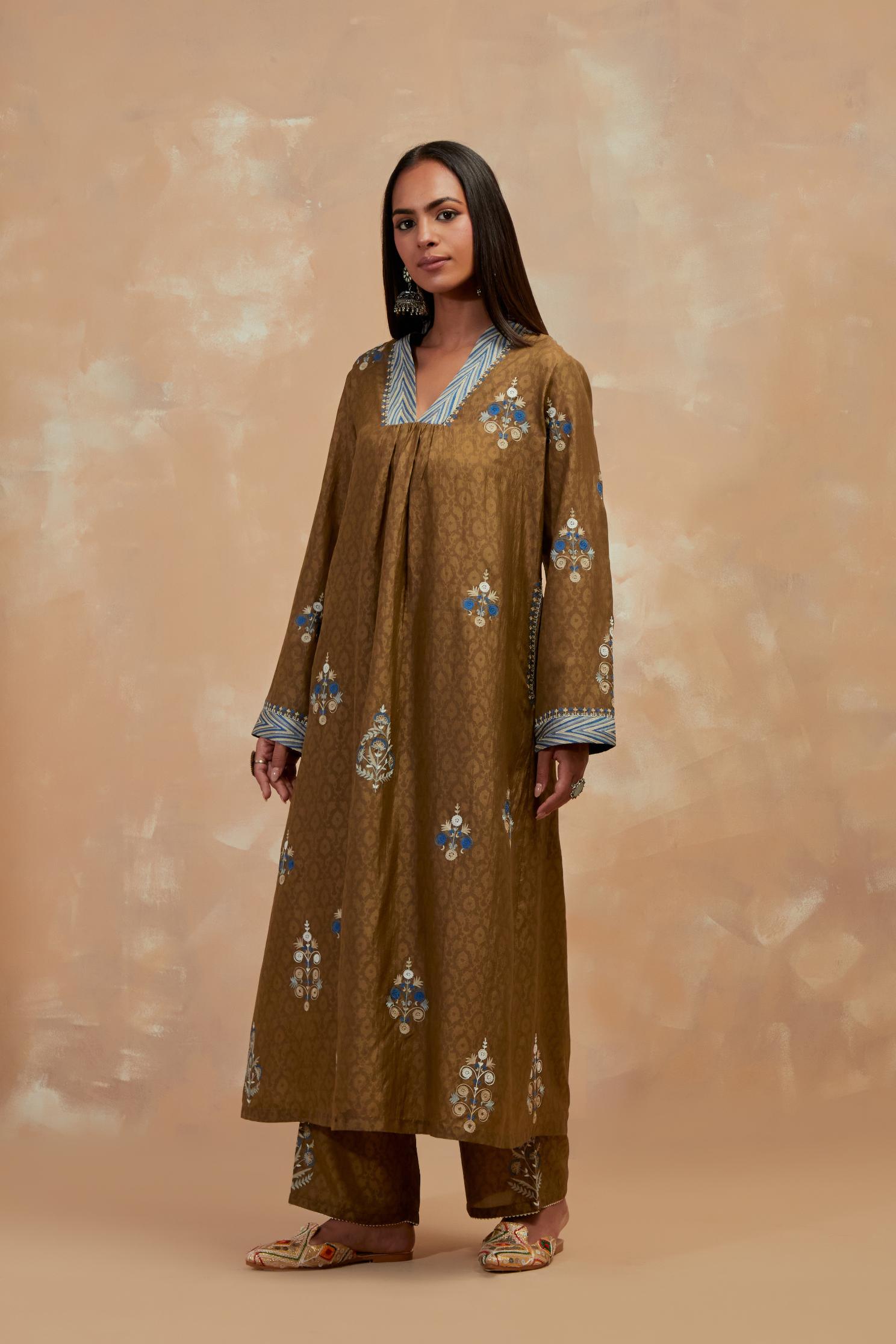 Olive green silk hand block printed easy fit kurta set, highlighted multicolored silk thread embroidery.