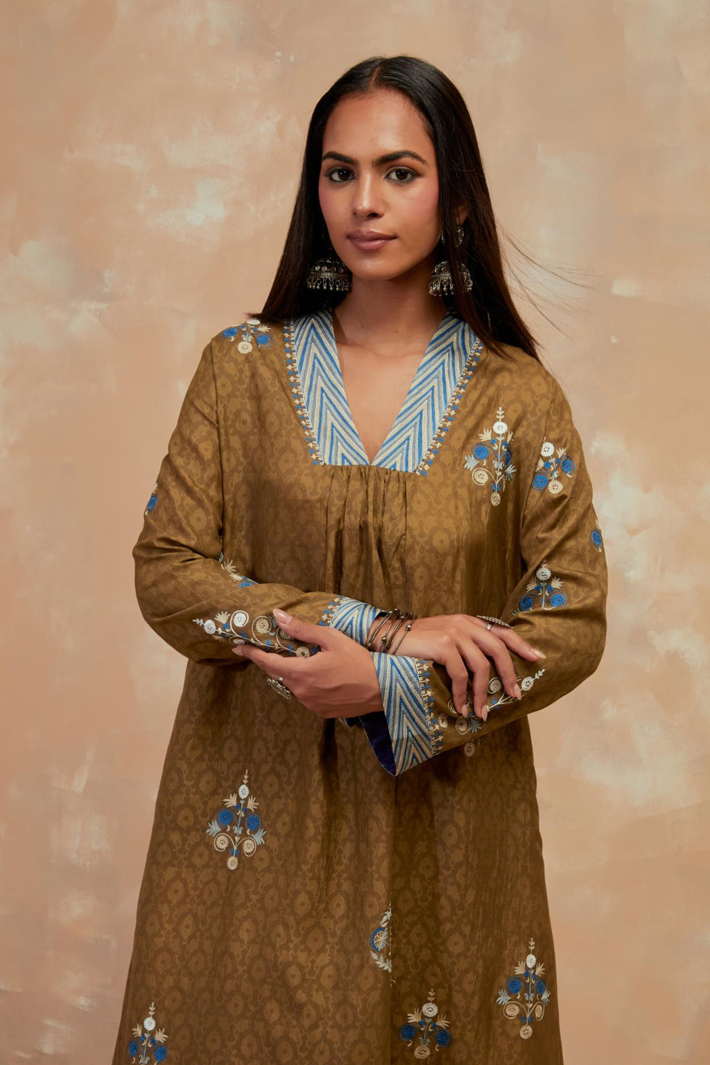 Olive green silk hand block printed easy fit kurta set, highlighted multicolored silk thread embroidery.