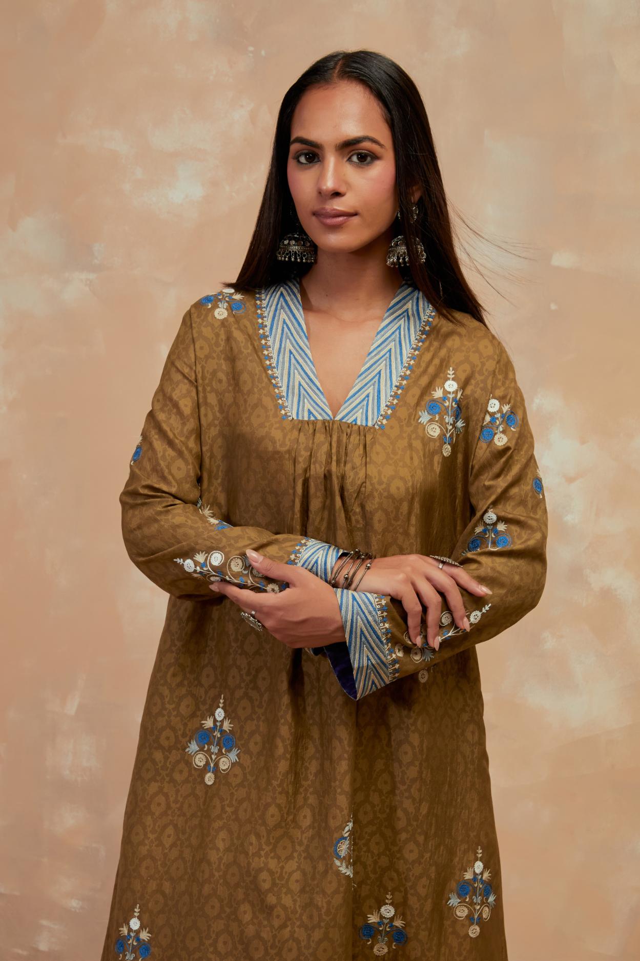 Olive green silk hand block printed easy fit kurta set, highlighted multicolored silk thread embroidery.