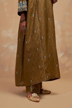 Olive green silk hand block printed A-line long kurta set with all-over multi colored thread embroidery.