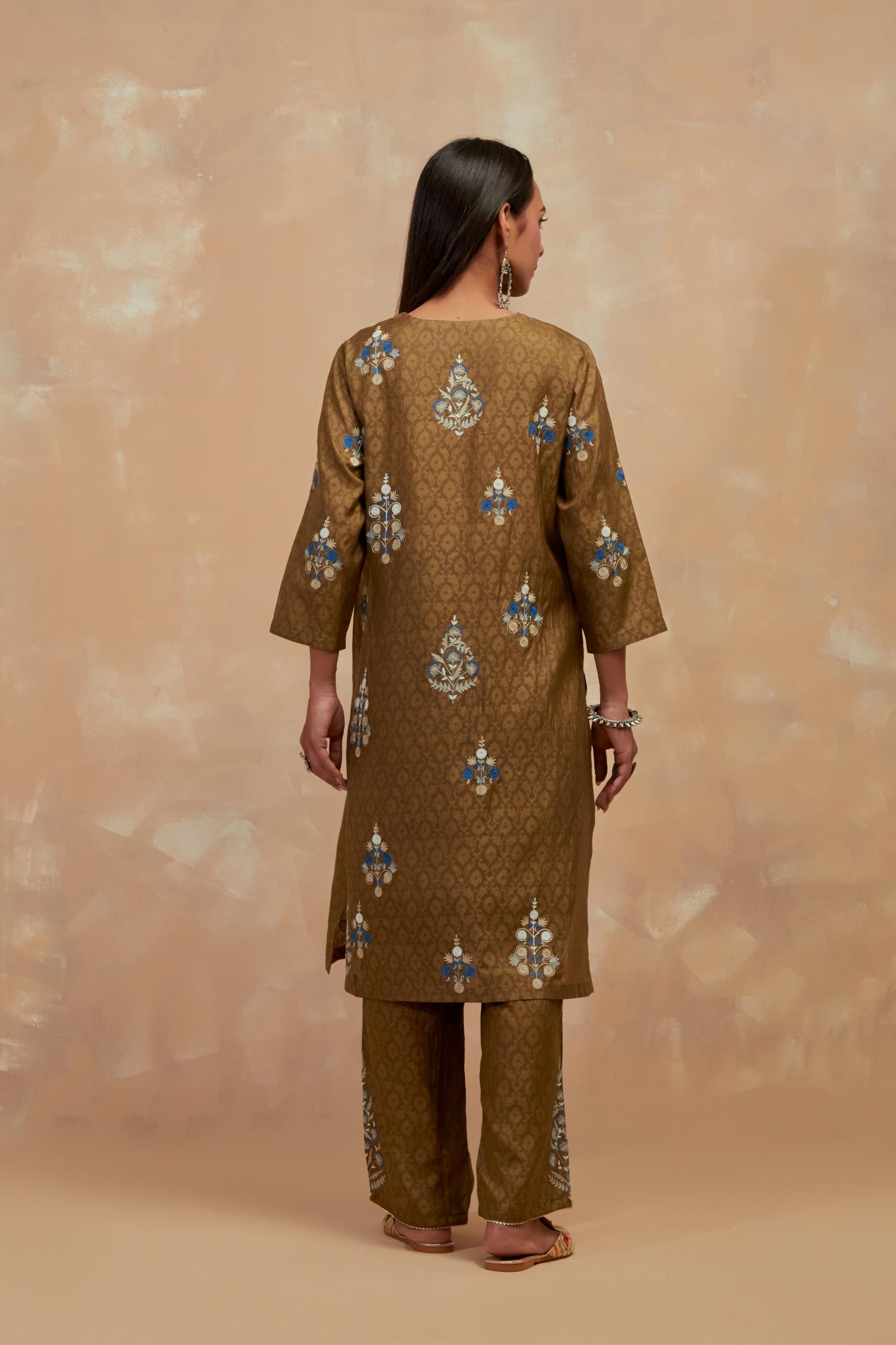 Olive green silk hand block printed short kurta set, highlighted with multi colored silk thread embroidery.