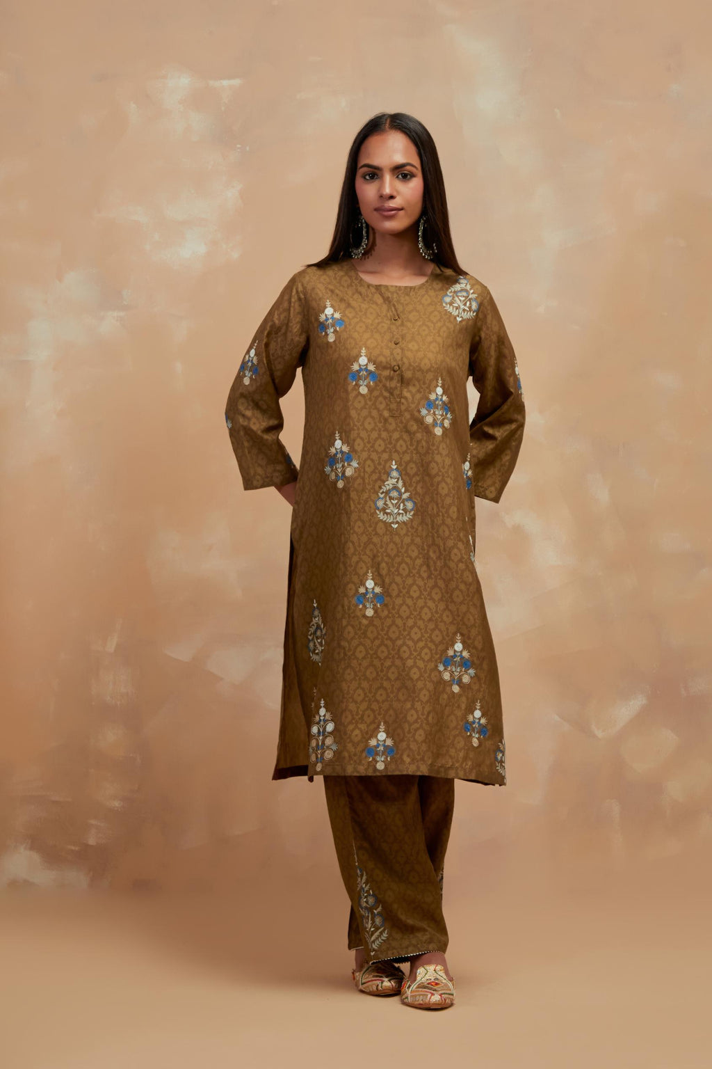 Olive green silk hand block printed short kurta set, highlighted with multi colored silk thread embroidery.