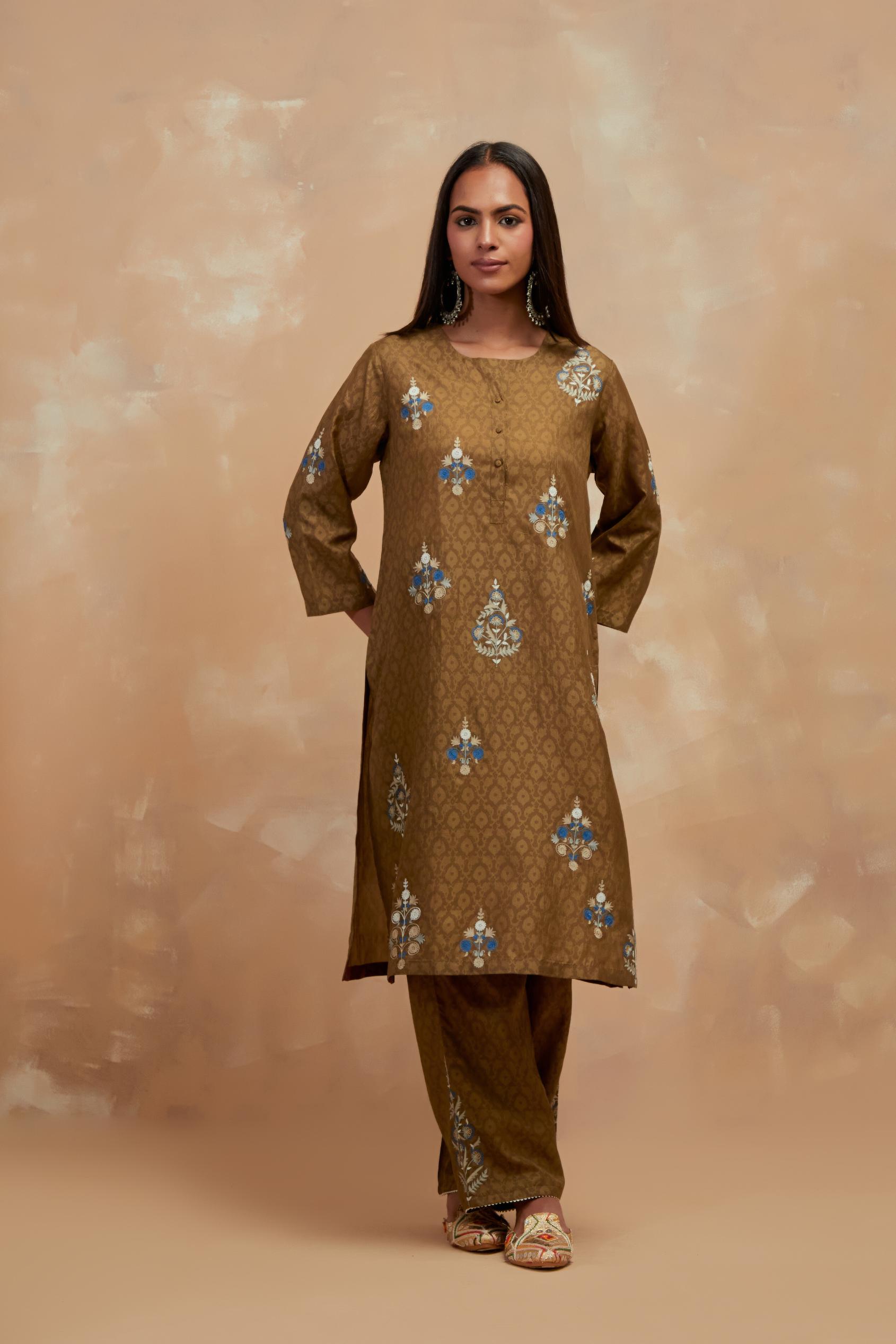 Olive green silk hand block printed short kurta set, highlighted with multi colored silk thread embroidery.