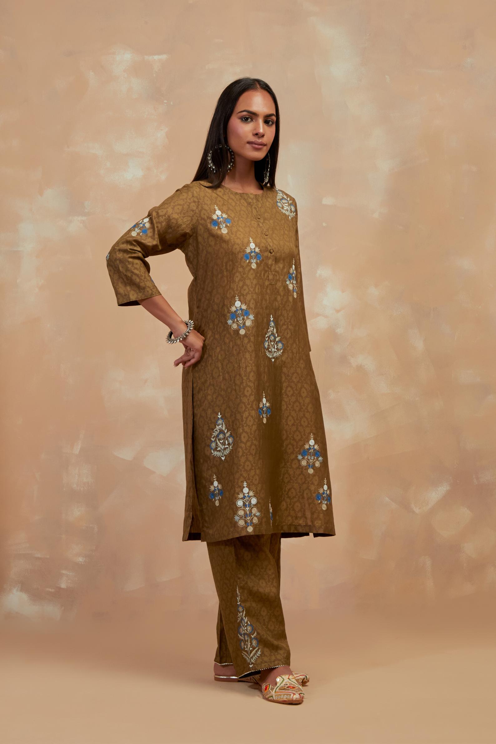 Olive green silk hand block printed short kurta set, highlighted with multi colored silk thread embroidery.