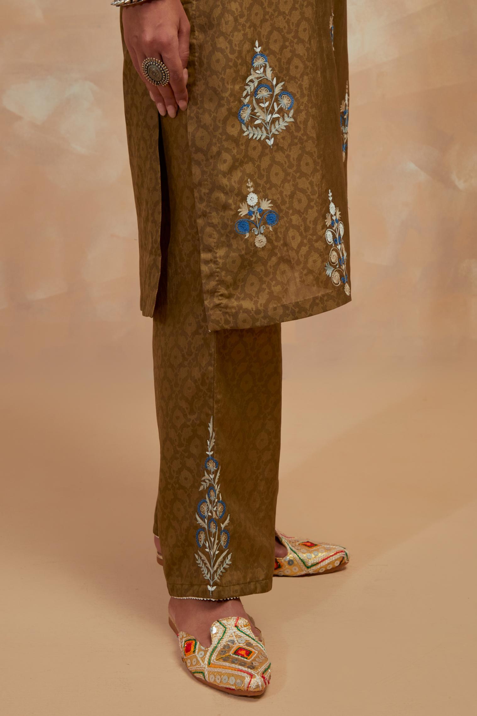 Olive green silk hand block printed short kurta set, highlighted with multi colored silk thread embroidery.