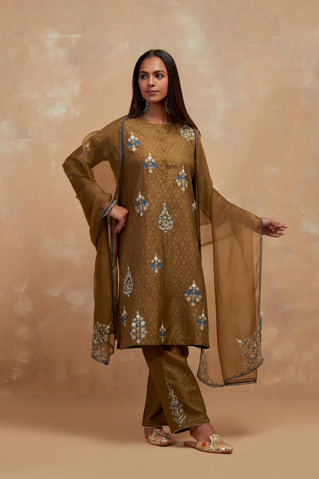 Olive green silk hand block printed short kurta set, highlighted with multi colored silk thread embroidery.