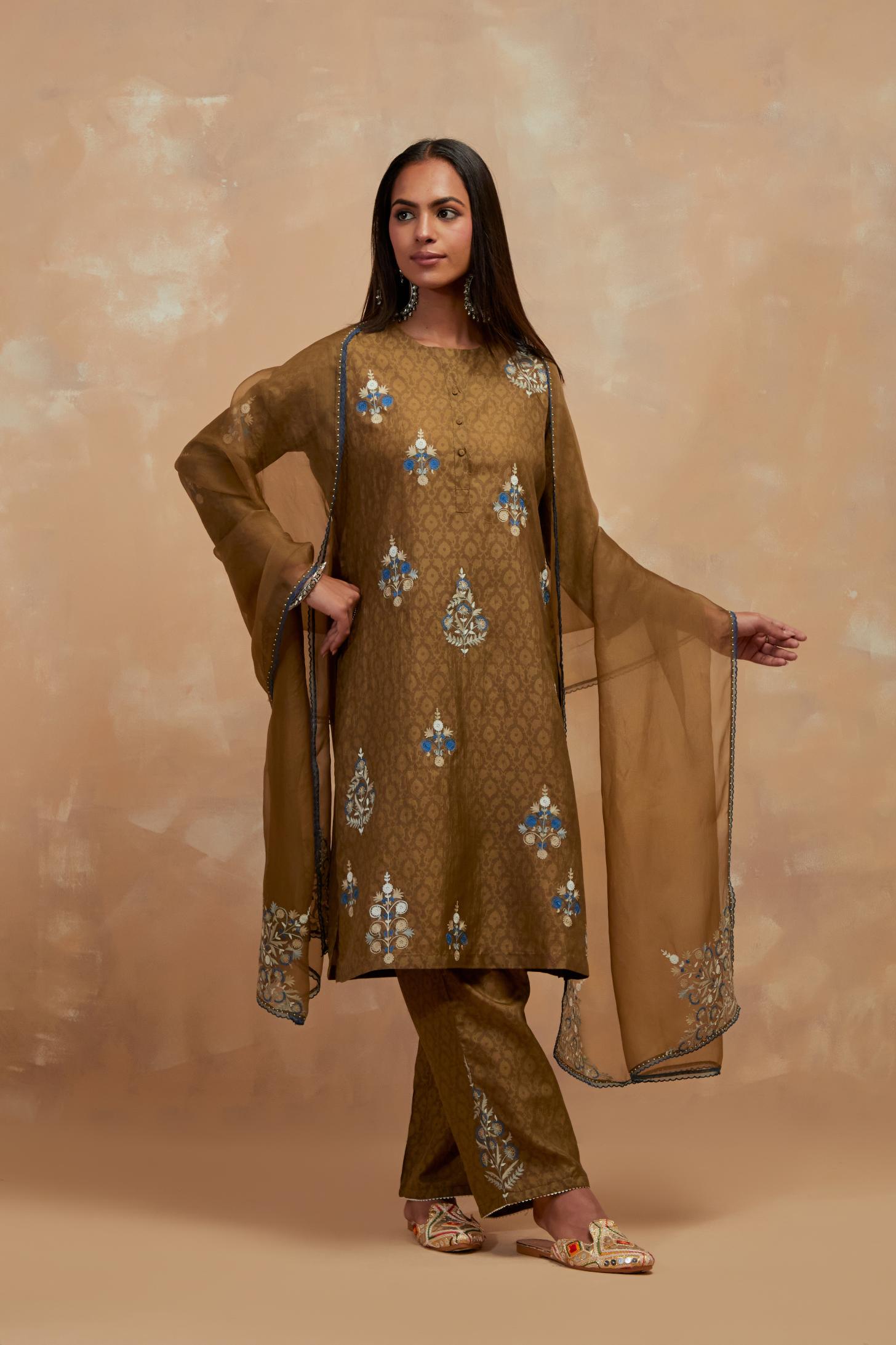 Olive green silk hand block printed short kurta set, highlighted with multi colored silk thread embroidery.