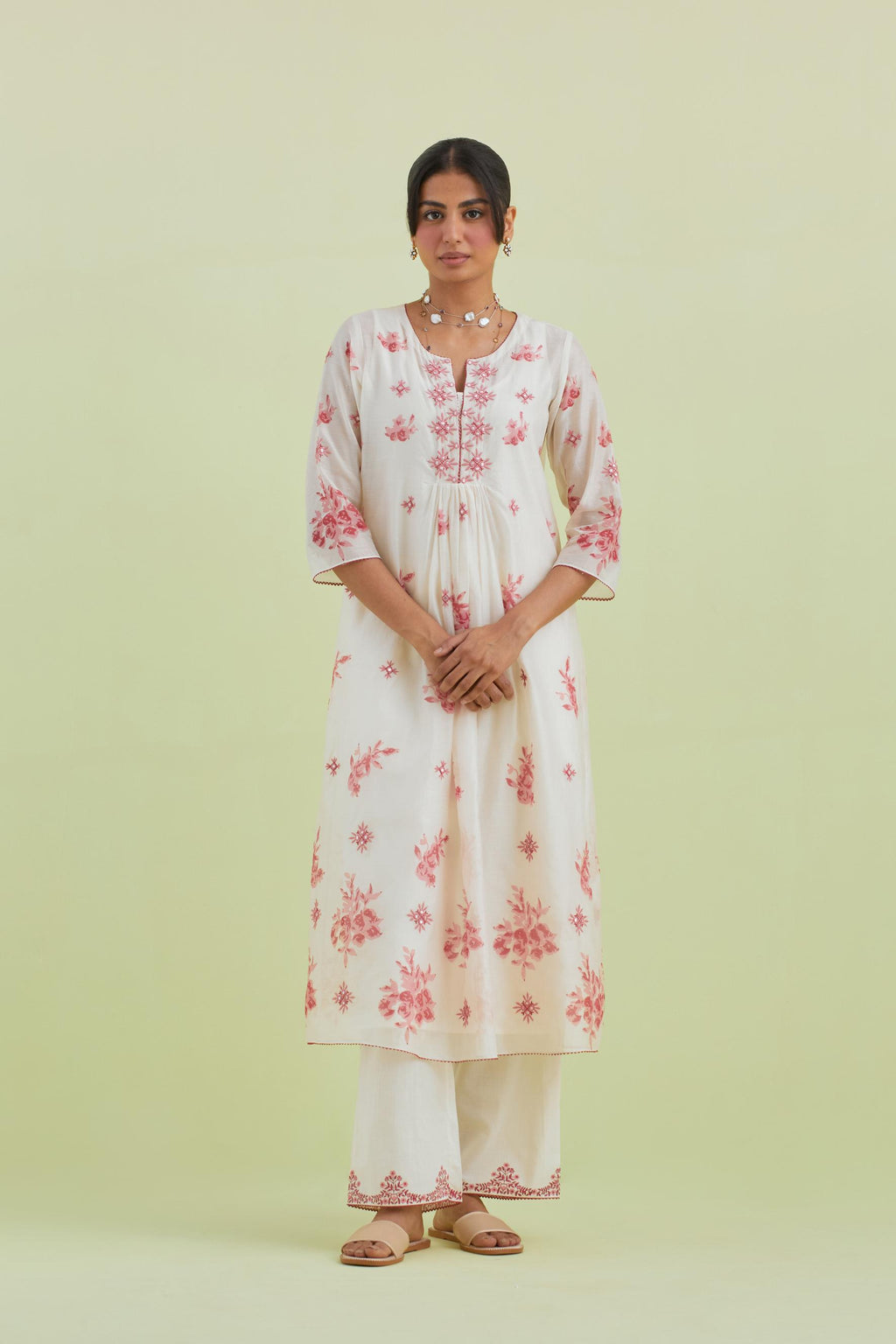 Pink and off-white hand block-printed silk chanderi straight long kurta dress set with pink thread and mirror embroidery.