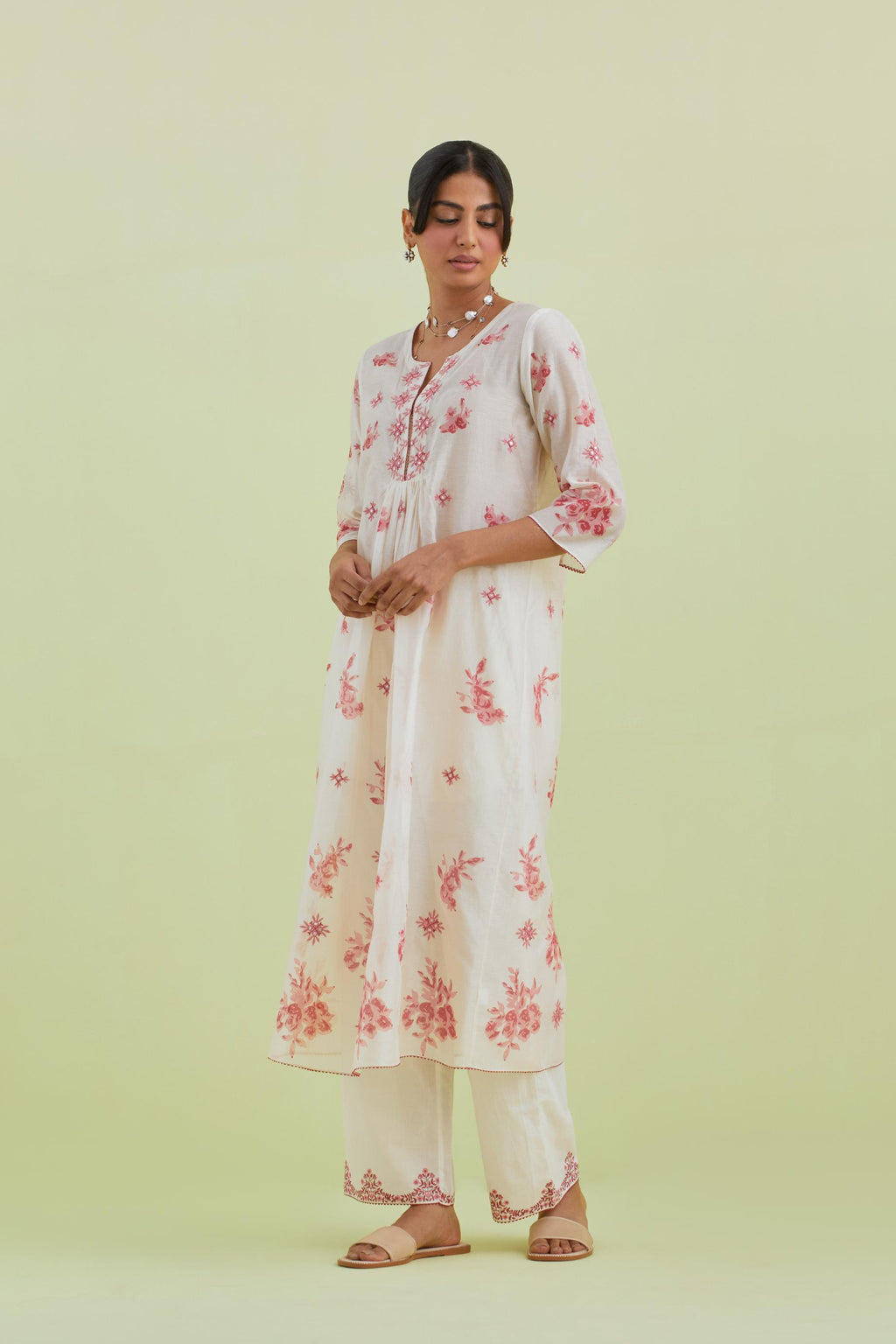 Pink and off-white hand block-printed silk chanderi straight long kurta dress set with pink thread and mirror embroidery.