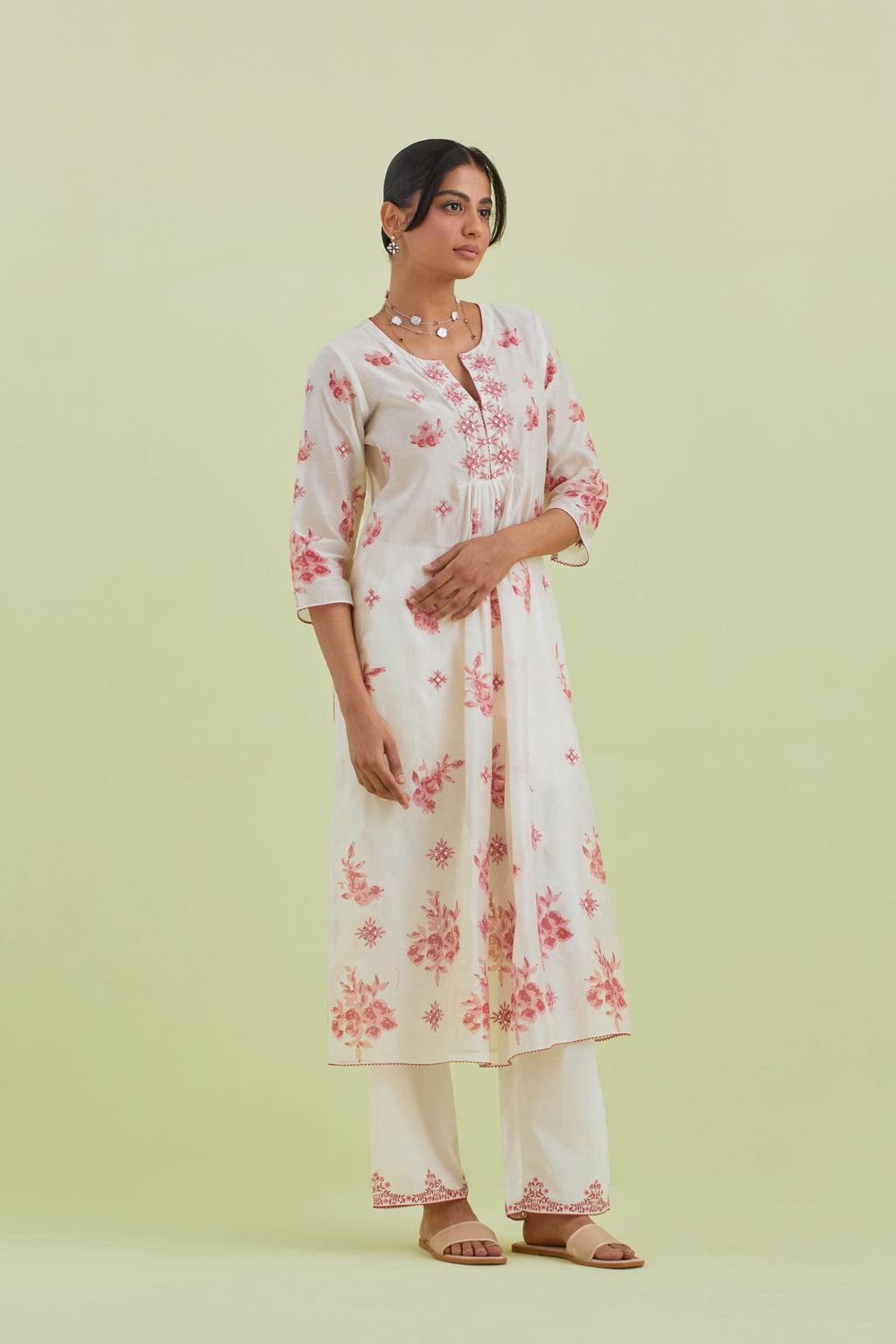 Pink and off-white hand block-printed silk chanderi straight long kurta dress set with pink thread and mirror embroidery.