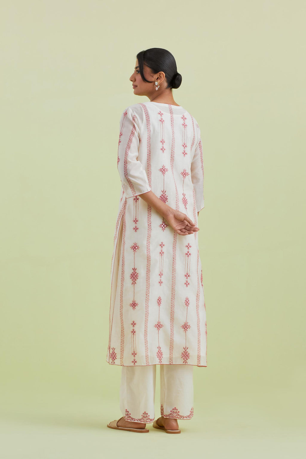 Pink and off-white silk chanderi hand block-printed straight long kurta set with pink thread and mirror embroidery along with kantha work.