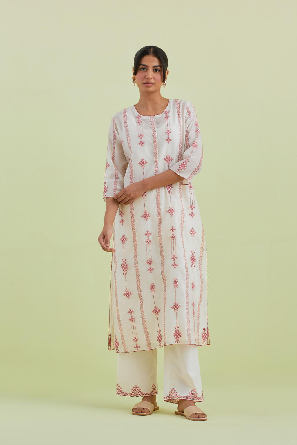 Pink and off-white silk chanderi hand block-printed straight long kurta set with pink thread and mirror embroidery along with kantha work.