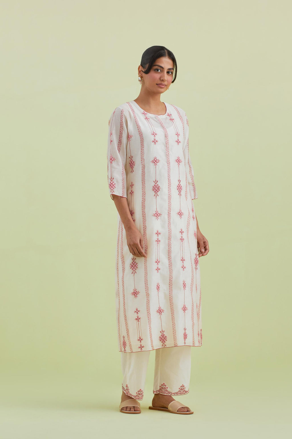 Pink and off-white silk chanderi hand block-printed straight long kurta set with pink thread and mirror embroidery along with kantha work.