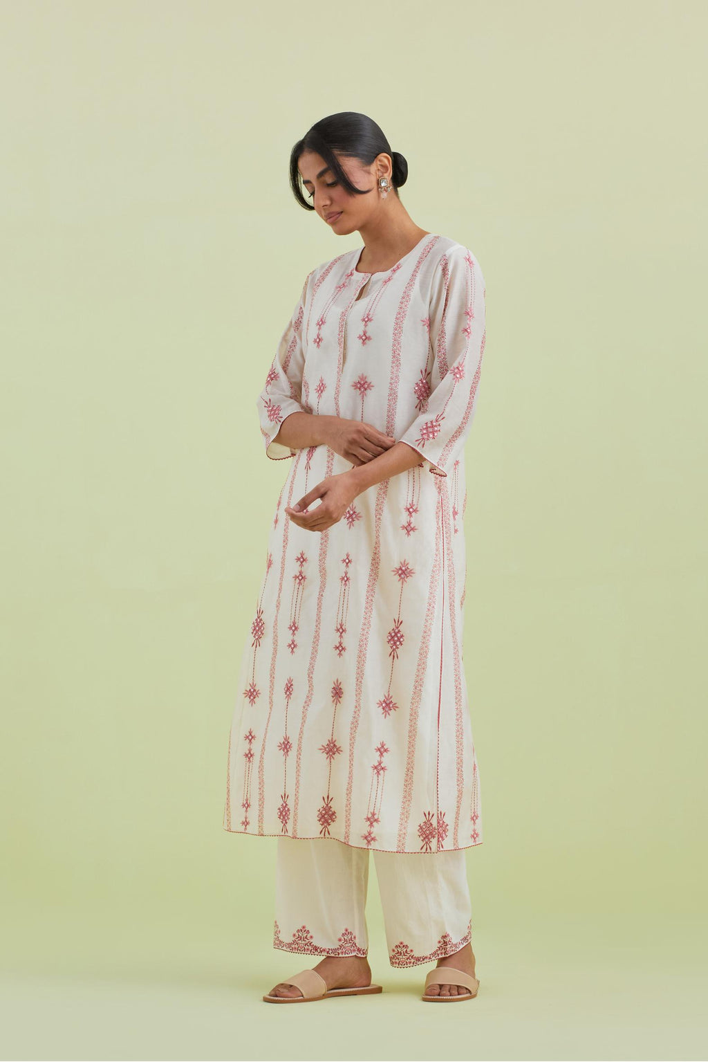 Pink and off-white silk chanderi hand block-printed straight long kurta set with pink thread and mirror embroidery along with kantha work.