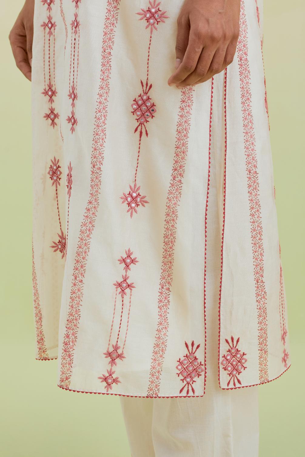 Pink and off-white silk chanderi hand block-printed straight long kurta set with pink thread and mirror embroidery along with kantha work.