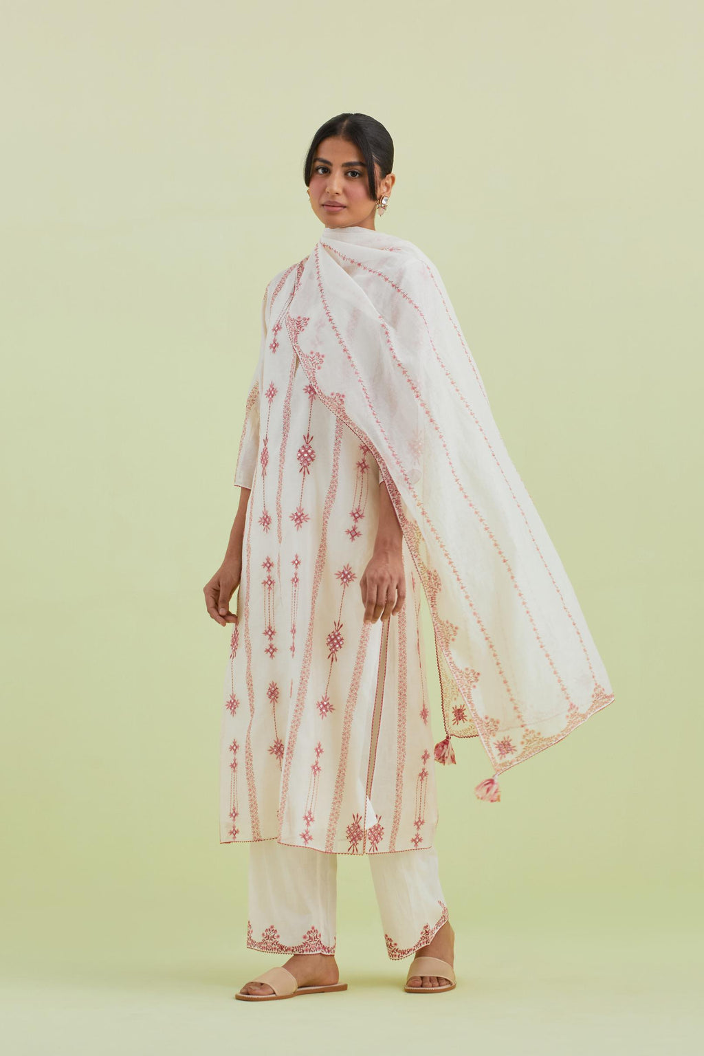 Pink and off-white silk chanderi hand block-printed straight long kurta set with pink thread and mirror embroidery along with kantha work.