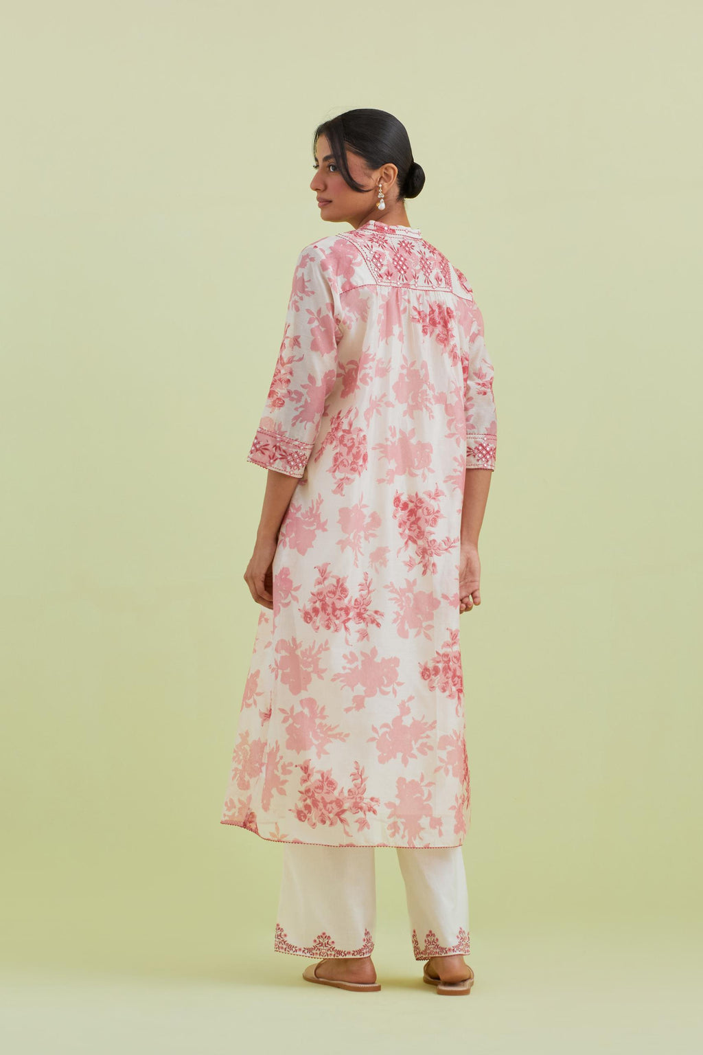 Pink and off-white silk chanderi hand block printed gathered kurta-dress set with thread and mirror work embroidery.