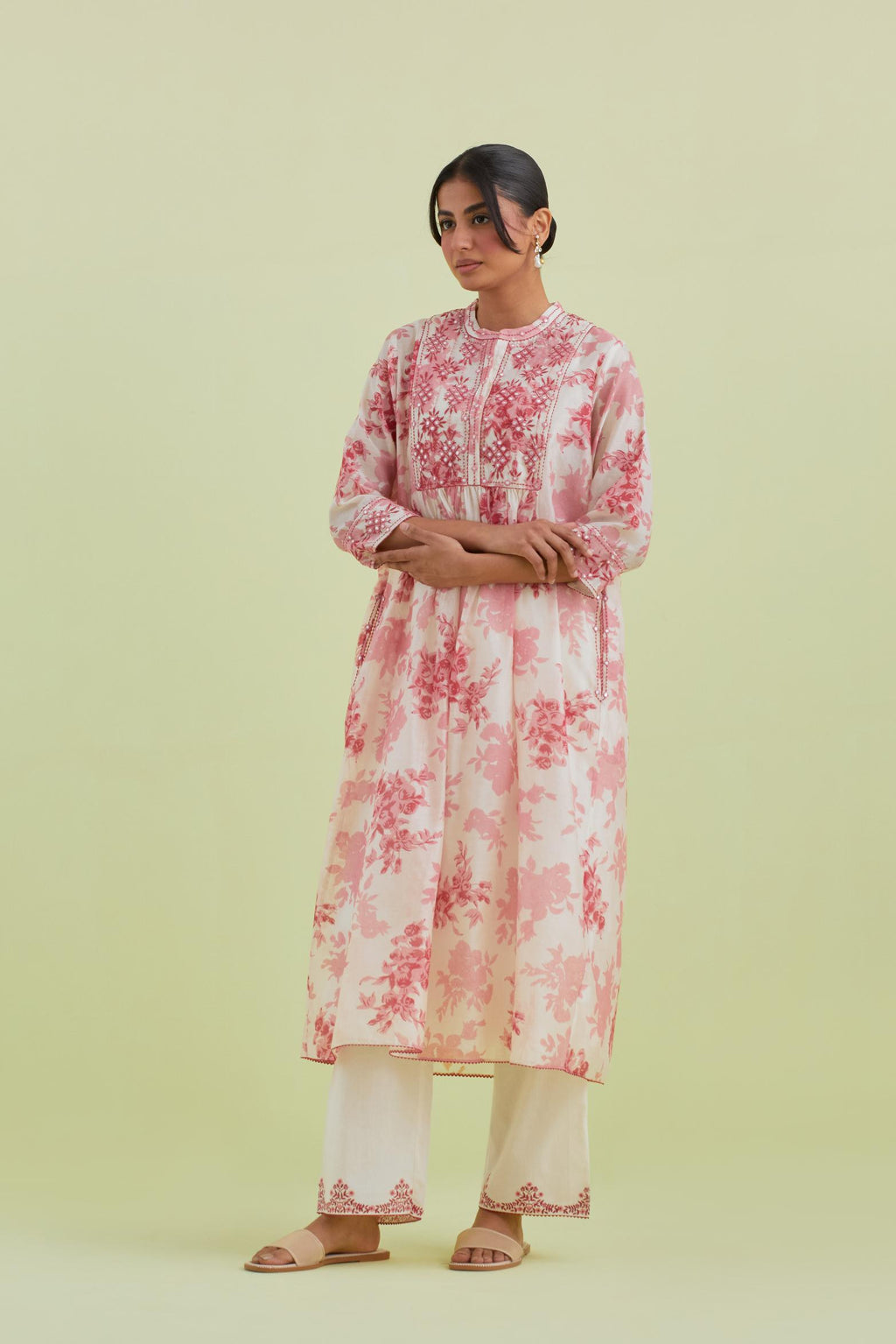 Pink and off-white silk chanderi hand block printed gathered kurta-dress set with thread and mirror work embroidery.