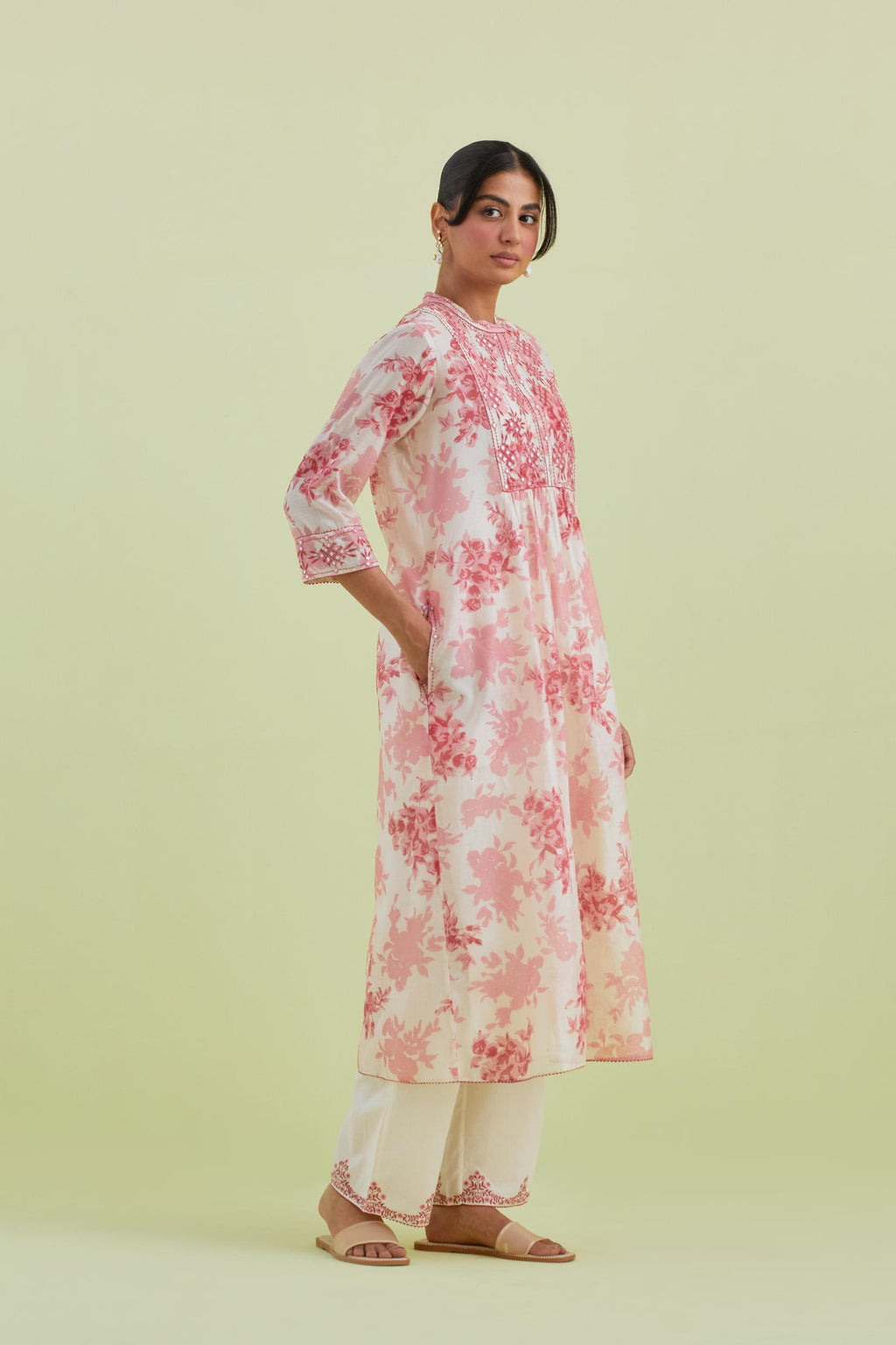 Pink and off-white silk chanderi hand block printed gathered kurta-dress set with thread and mirror work embroidery.