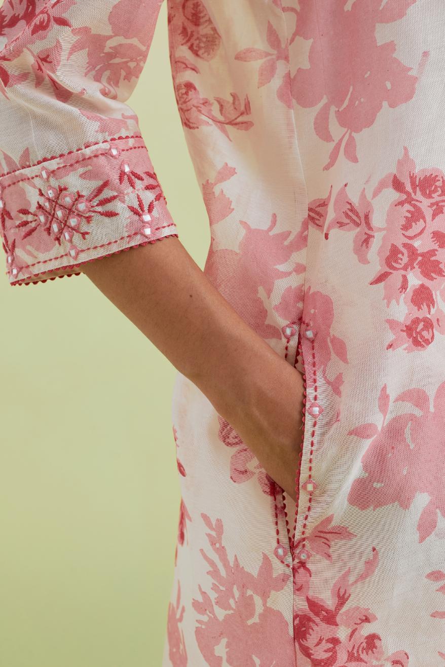 Pink and off-white silk chanderi hand block printed gathered kurta-dress set with thread and mirror work embroidery.