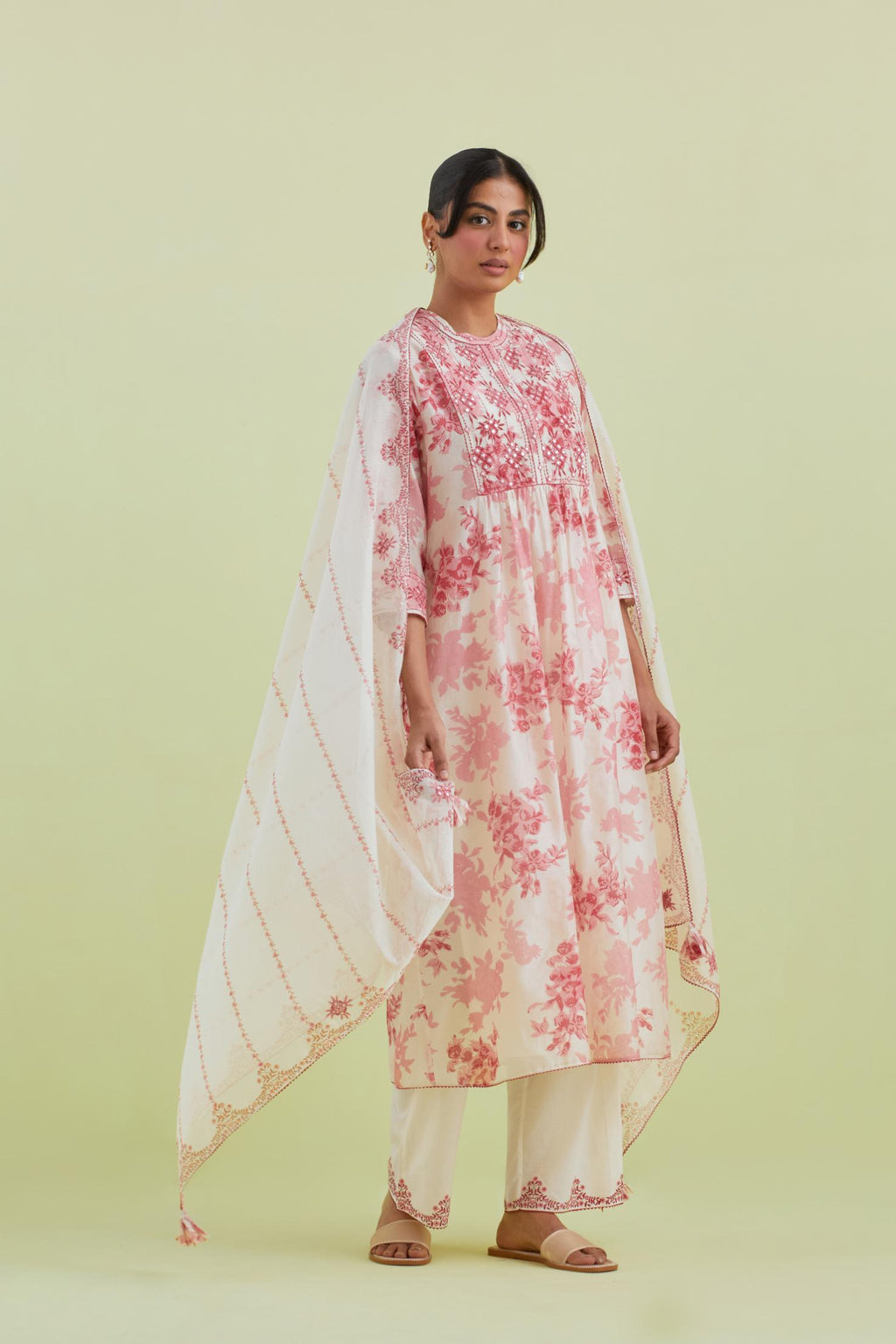 Pink and off-white silk chanderi hand block printed gathered kurta-dress set with thread and mirror work embroidery.