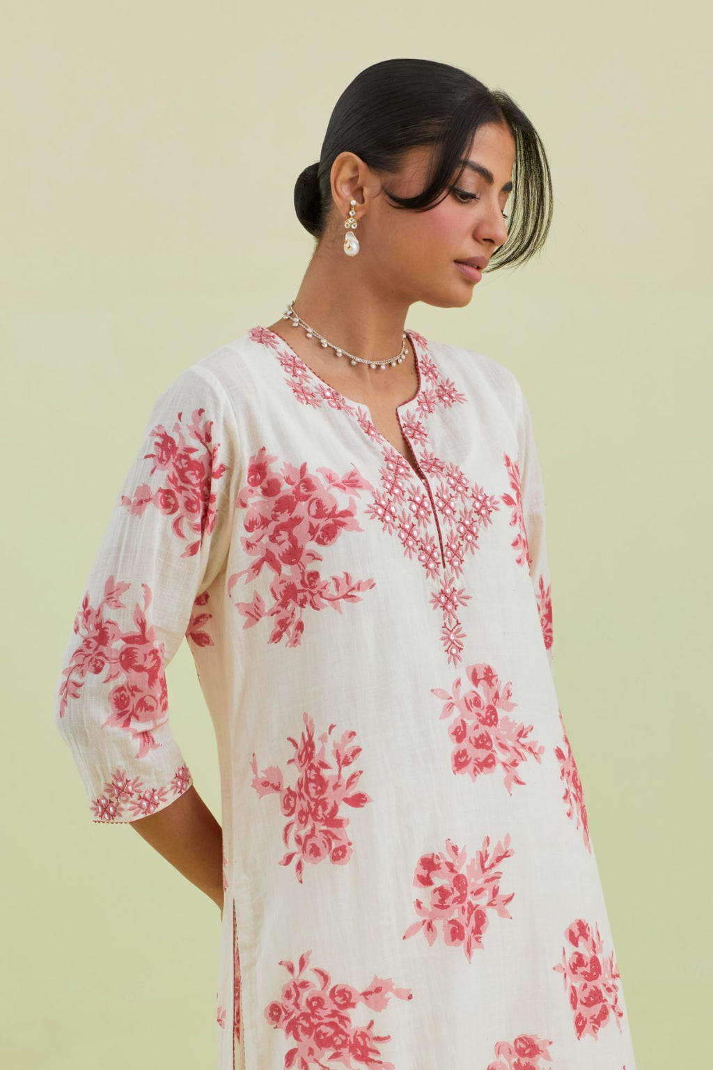 Pink and off-white cotton hand block-printed straight long kurta set with pink thread and mirror embroidery.