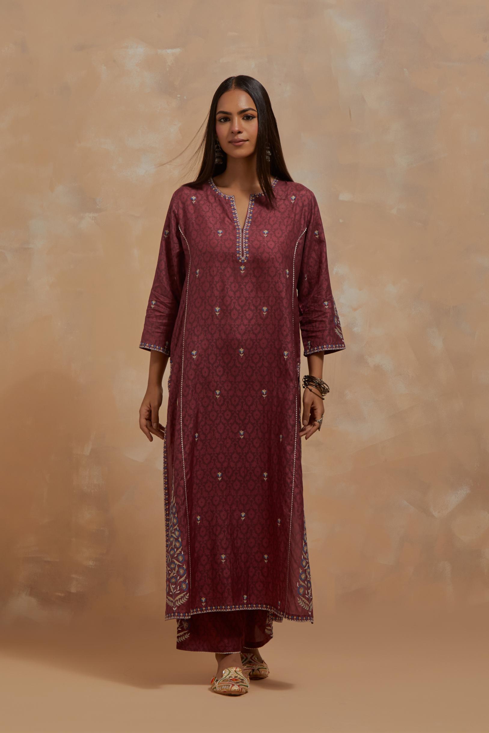 Deep berry silk hand block printed kalidar straight kurta set, highlighted with multi colored silk thread embroidery.