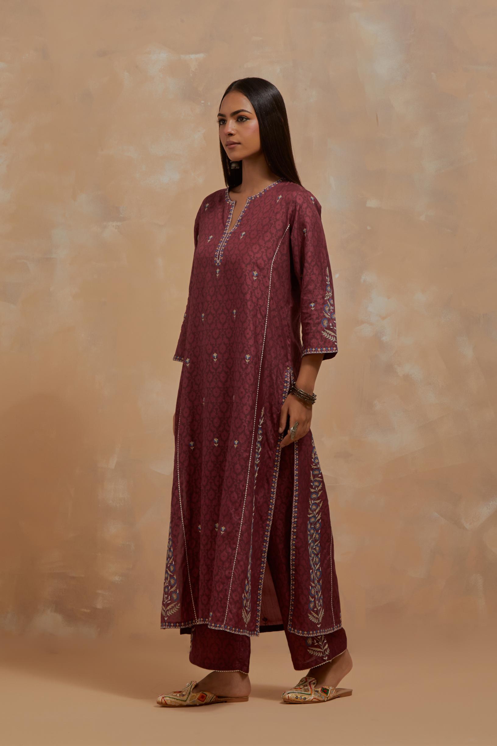 Deep berry silk hand block printed kalidar straight kurta set, highlighted with multi colored silk thread embroidery.