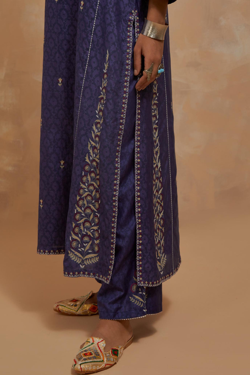 Ford blue silk hand block printed kalidar straight kurta set, highlighted with multi colored silk thread embroidery.
