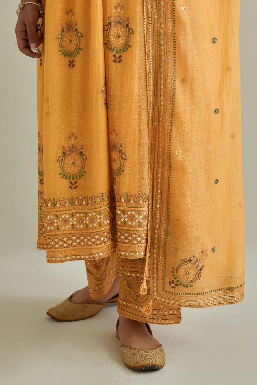 Yellow cotton chanderi embroidered kurta dress set with V neck, yoke and fine gathers at empire line.