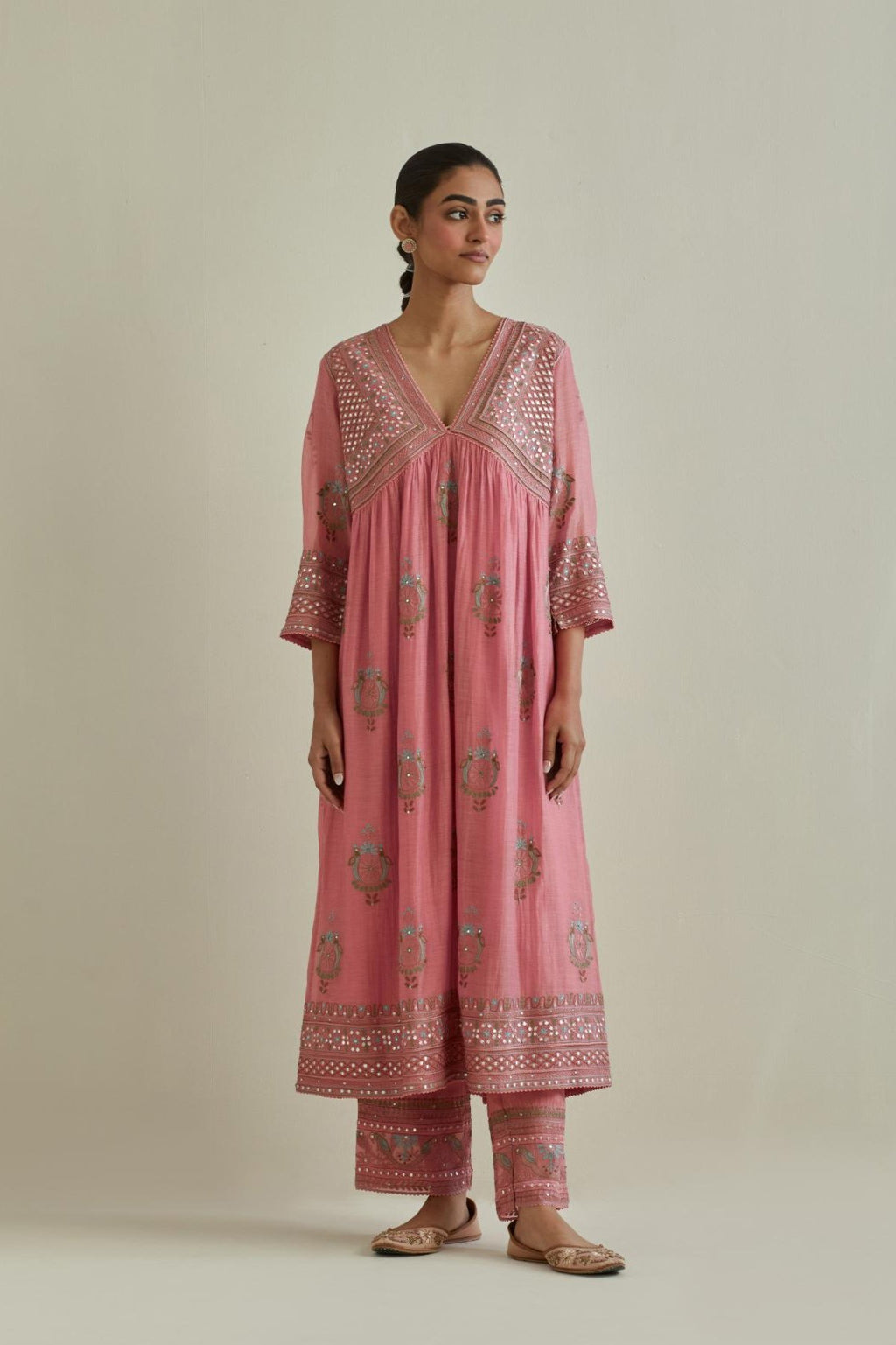 Pink cotton chanderi embroidered kurta dress set with V neck, yoke and fine gathers at empire line.