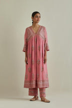 Pink cotton chanderi embroidered kurta dress set with V neck, yoke and fine gathers at empire line.