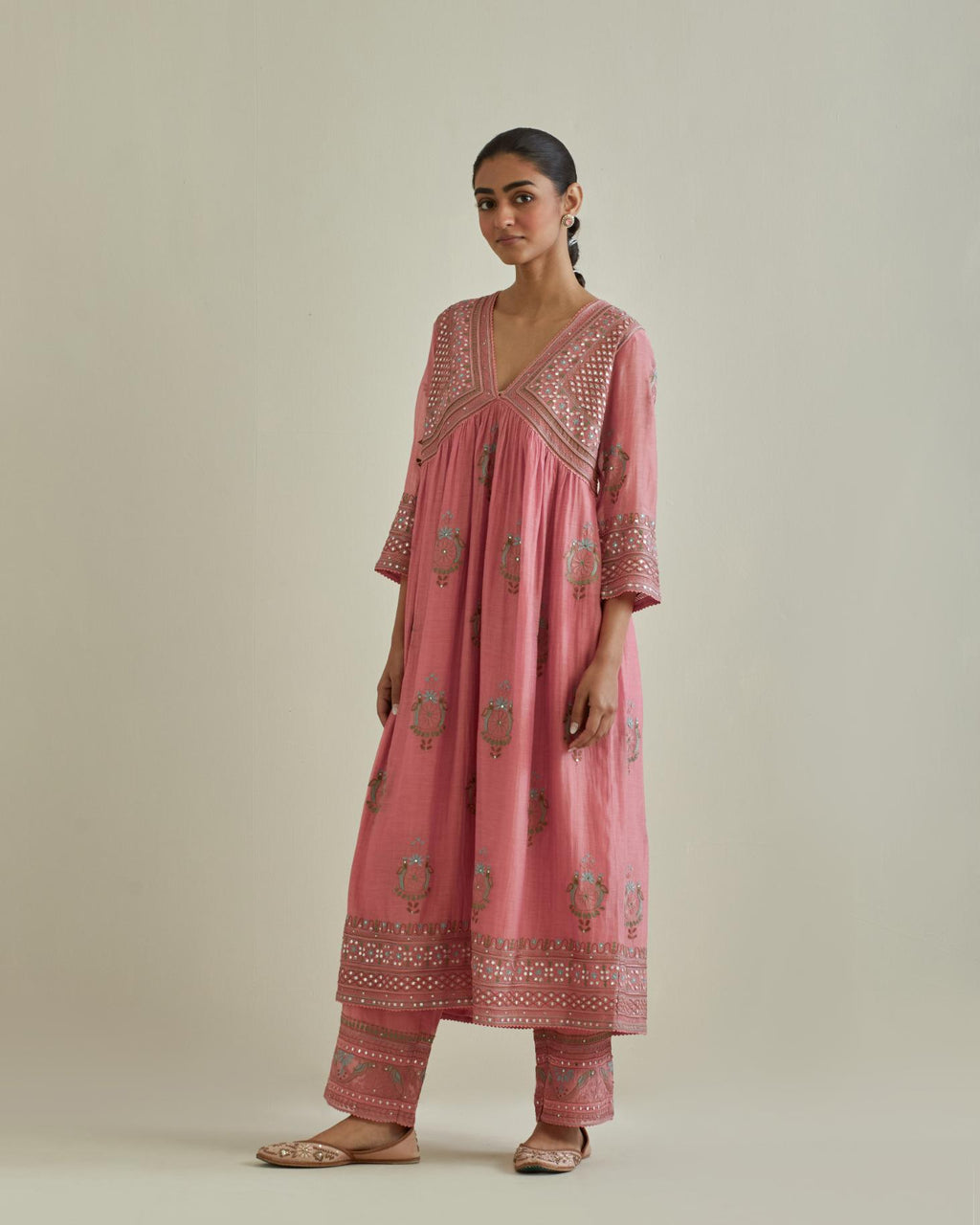 Pink cotton chanderi embroidered kurta dress set with V neck, yoke and fine gathers at empire line.