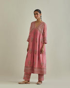 Pink cotton chanderi embroidered kurta dress set with V neck, yoke and fine gathers at empire line.