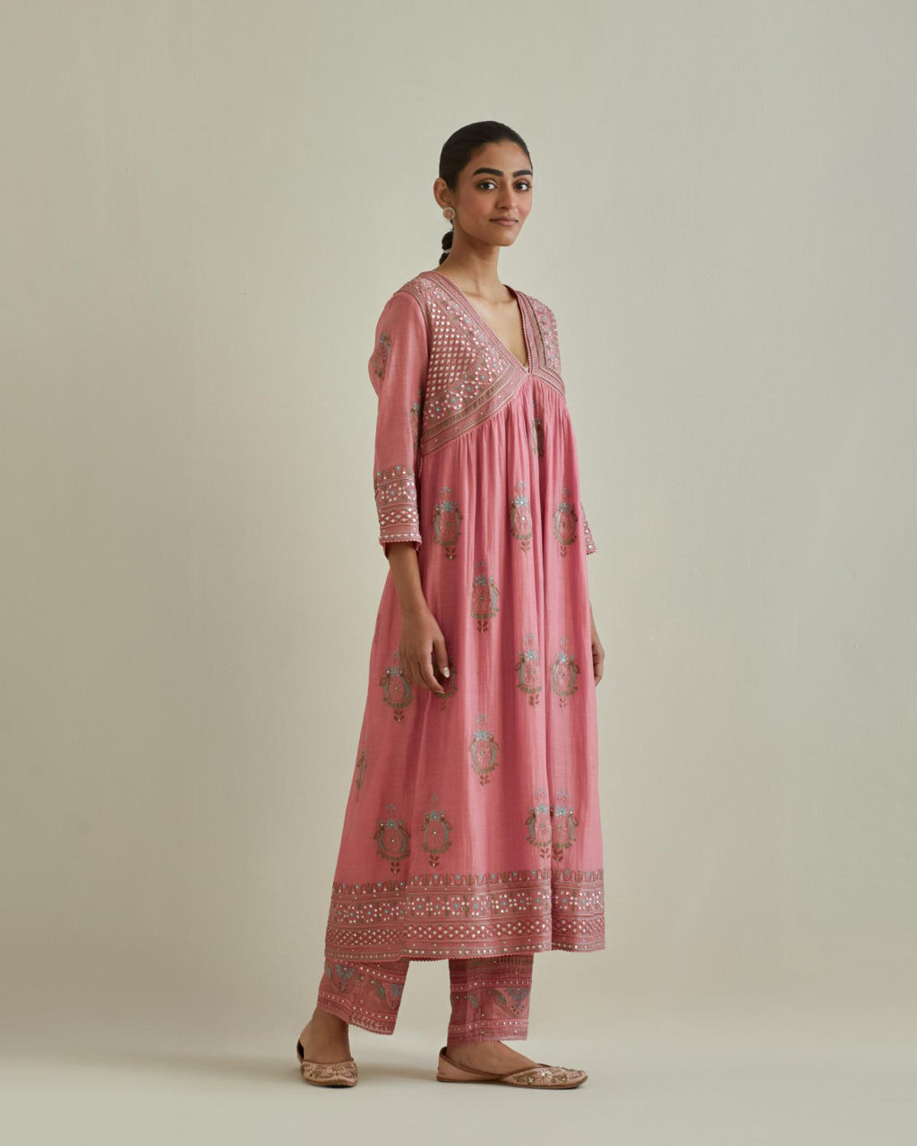 Pink cotton chanderi embroidered kurta dress set with V neck, yoke and fine gathers at empire line.