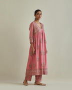 Pink cotton chanderi embroidered kurta dress set with V neck, yoke and fine gathers at empire line.